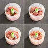 A collage of four images showing a mini food chopper with meat being processed. Náhľad obrázku produktu