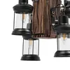 Close-up of a rustic-style chandelier with multiple lantern-shaped lights. Produktbild-Vorschau