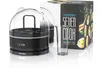 A black and clear egg cooker with a measuring cup and its packaging, presented on a white background. Anteprima dell’immagine prodotto