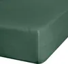 A close-up, angled view of a dark green fitted sheet.
