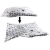 An image showing a vacuum seal bag before and after air has been removed, demonstrating its space-saving function. Náhled obrázku produktu