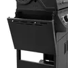 A close-up view of the side of a black gas grill, showing a storage compartment with a hinged door. Produktbild-Vorschau