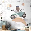 Vlies Fototapete - Teddy Bear in a Racing Car 400x280 cm Produktbild-Vorschau 1