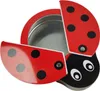 A ladybug-shaped tin box with its lid open, revealing the inside. Produktbild-Vorschau