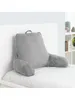 A gray reading pillow with armrests is placed on a bed. Anteprima dell’immagine prodotto