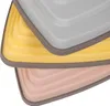 A close-up view of three stacked, colorful balance stones. Produktbild-Vorschau
