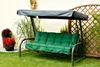 A garden swing with a green cushion and a gray canopy, set on a lawn with plants and a trellis in the background. Produktbild-Vorschau