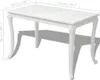 A white dining table with dimensions shown. Produktbild-Vorschau
