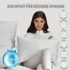 A woman is holding a pillow in front of a plain background, with marketing text and icons surrounding her. Produktbild-Vorschau