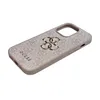 A pink and gold Guess phone case is shown against a white background. Voir les images du produit