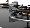 Close-up view of a gas stove top with multiple burners. Anteprima dell’immagine prodotto
