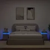 A bedroom scene with a bed, nightstands, and artwork on the wall. Produktbild-Vorschau