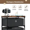 A close-up view of a storage dresser with a flip clock and decorative items on top, set against a white background. Podgląd zdjęcia produktu