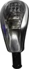 A close-up studio shot of a car gear shift knob. Voir les images du produit