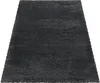 A dark gray shaggy rug is shown from a diagonal angle on a white background. Produktbild-Vorschau