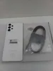 A white Samsung smartphone and its accessories are laid out on a white surface. Produktbild-Vorschau