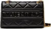 A black Valentino handbag with gold chain strap. Produktbild-Vorschau