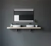 A modern bathroom vanity with a double sink and a lighted mirror. Produktbild-Vorschau