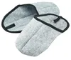 A pair of light gray felt slippers with black trim, shown from a slightly elevated angle. Produktbild-Vorschau