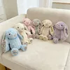 Peluche lapin de 20 cm – Adorable peluche à oreilles Voir les images du produit 2