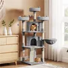 A multi-level cat tree with two cats, placed in a room next to a wooden dresser and near a window with sheer curtains. Produktbild-Vorschau
