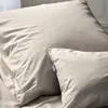 A close-up view of two pillows with textured fabric. Produktbild-Vorschau