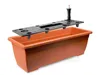 A terracotta planter box with a black insert for water storage and planting. Anteprima dell’immagine prodotto