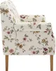 A side view of a floral patterned armchair. Produktbild-Vorschau
