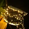 A close-up of a spool of warm white LED string lights. Náhled obrázku produktu