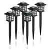 A set of seven black solar garden lights with white grid-like panels, arranged in a diagonal line against a white background. Anteprima dell’immagine prodotto