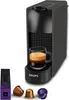 A Nespresso coffee machine with a cup of coffee and coffee capsules. Produktbild-Vorschau