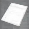 A white plastic sheet is laid flat on a gray surface. Produktbild-Vorschau