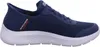 A side view of a blue Skechers slip-on shoe with a white sole. Anteprima dell’immagine prodotto