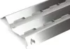 A close-up, angled shot of a metal grill heat shield with a flame logo. Produktbild-Vorschau
