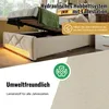 A bed with its storage compartment open, showing the hydraulic lift mechanism and a green blanket inside. Text overlays describe features. Produktbild-Vorschau