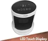A white tower heater with a black mesh front and a black LED touch display on top. Podgląd zdjęcia produktu