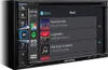 A car stereo system displaying a music selection screen. Produktbild-Vorschau