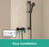 A black shower fixture mounted on a tiled wall, with an inset diagram showing a universal fit. Anteprima dell’immagine prodotto