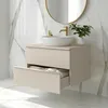 A bathroom vanity with a sink and faucet. Náhled obrázku produktu