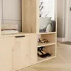 A close-up view of a wooden wardrobe with shelves and a drawer, displaying folded clothes and shoes. Voir les images du produit