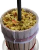 A close-up view of a wooden fruit press filled with crushed apples. Náhľad obrázku produktu
