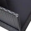 Close-up view of the corner of a black rattan sofa bed with a dark gray cushion. Náhľad obrázku produktu
