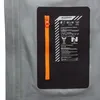 Detailansicht der Haldigrat HS Hooded Jacket für Herren von Mammut; zeigt eine orangefarbene Reißverschlusstasche mit Symbolen für Notruf und Lebensunterstützung. Produktbild-Vorschau