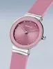 A close-up studio shot of a pink Bering watch with a silver band. Produktbild-Vorschau