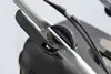 Close-up of a handle mechanism on a lawnmower. Produktbild-Vorschau