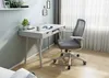 A modern desk and chair setup in a room with a window and curtains. Produktbild-Vorschau