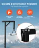 A close-up view of a black metal game hoist with a cable and pulley system, set against a backdrop of mountains and sky. Text overlays describe product features. Náhľad obrázku produktu