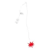 A white battery pack with a label is attached to a thin white wire, which leads down to a red star-shaped ornament. Produktbild-Vorschau