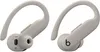 A pair of beige wireless earbuds with ear hooks. Náhled obrázku produktu