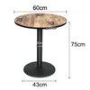 A round table with a wood-grain top and a black pedestal base, shown with dimensions indicated by text and lines. Produktbild-Vorschau